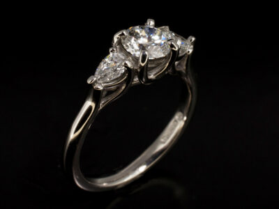 Ladies Lab Grown Diamond Trilogy Engagement Ring, Platinum Claw Set Trilogy Design, Round Brilliant Cut Lab Grown Diamond 0.50ct, Pear Cut Lab Grown Diamonds 0.23ct Total