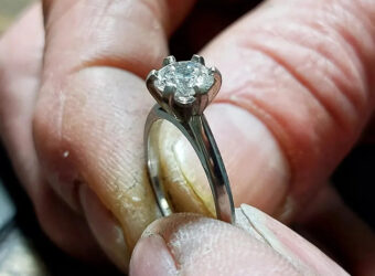 A bespoke diamond engagement ring nears completion at Blair and Sheridan