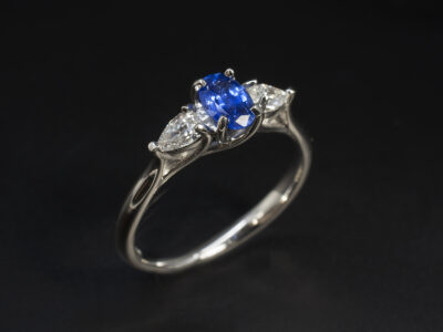 Ladies Sapphire and Diamond Trilogy Ring, Platinum Claw Set Lattice Design, Oval Cut Blue Sapphire 0.59ct, Pear Shaped Lab Grown Diamonds 0.24ct Total (2)