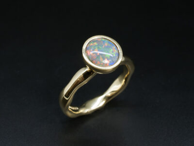 Ladies Solitaire Opal Dress Ring, 18kt Yellow Gold Rub over Set Design, Round Cut Cabochon Opal, Uneven Shank Detail