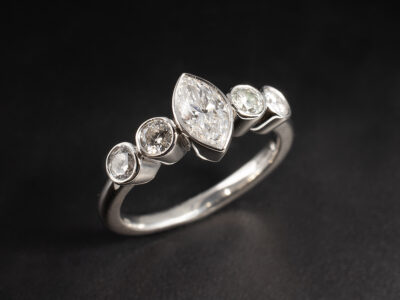 Ladies 5 stone Diamond Engagement Ring, Platinum Rub over Set Design, Marquise Cut Diamond 0.51ct, Round Brilliant Cut Diamonds 0.45ct Total (4)