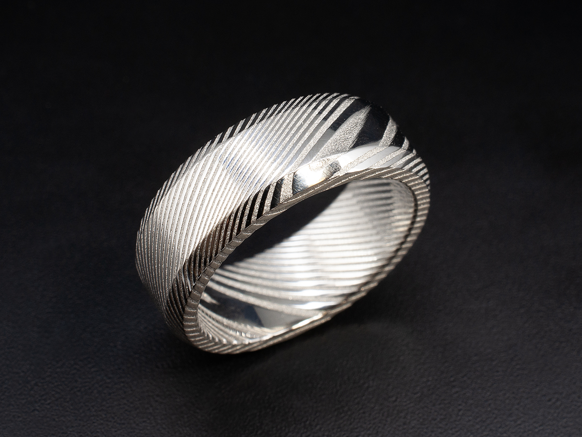 Gents Bespoke Damascus Steel Wedding Ring, 7mm Design with Chamfered Edge Design and moderate Acid Treatment, Damascus Dense Twist Pattern