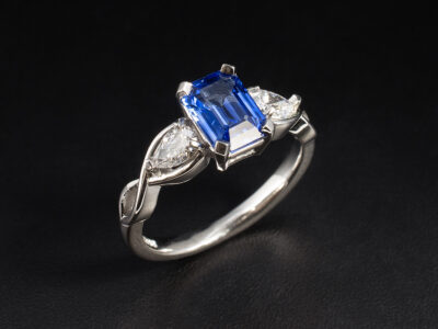 Ladies Sapphire and Lab Grown Diamond Trilogy Engagement Ring, Platinum Claw Set Twist Design, Octagonal Cut Blue Sapphire 0.94ct, Pear Shaped Lab Grown Diamond 0.31ct Total (2)