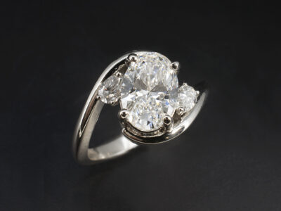 Ladies Trilogy Lab Grown Diamond Engagement Ring, Platinum Claw Set Twist Design, Oval Cut Lab Grown Diamond 1.80ct, Pear Shape Lab Grown Diamonds 0.10ct Total (2)