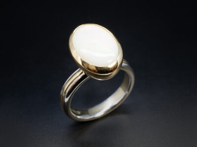 Ladies Solitaire Opal Ring, Platinum and 18kt Yellow Gold Two Tone Rub over Set Design, Oval Shaped Opal 15x10mm