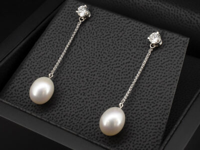 18kt White Gold Diamond and Pearl Earrings, Chain Drop Design, Round Brilliant Cut Lab Grown Diamonds 0.62ct Total, Oval Shaped River Cultured Pearls 10x8 (2)