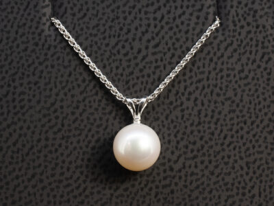 9kt White Gold Pearl Pendant, Rub over Set Cultured River Pearl on Split Bale, Hidden Round Cut Pink Sapphire on Back