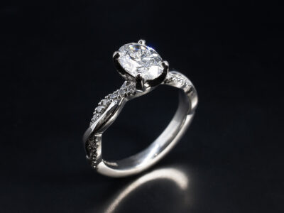 Ladies Diamond Engagement Ring, Platinum Claw Set Twist Design with Diamond Set Band, Oval Cut Diamond 1.01ct, Round Brilliant Cut Diamonds 0.30ct Total (20)