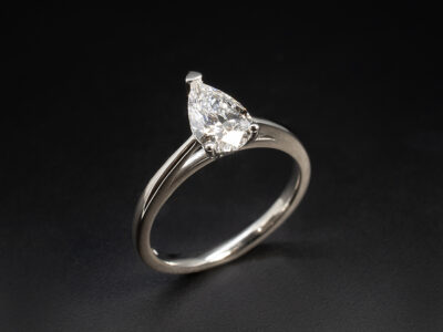 Ladies Diamond Solitaire Engagement Ring, Platinum Claw Set Tapering Wed-Fit Design, Pear Shaped Natural Diamond 0.91ct