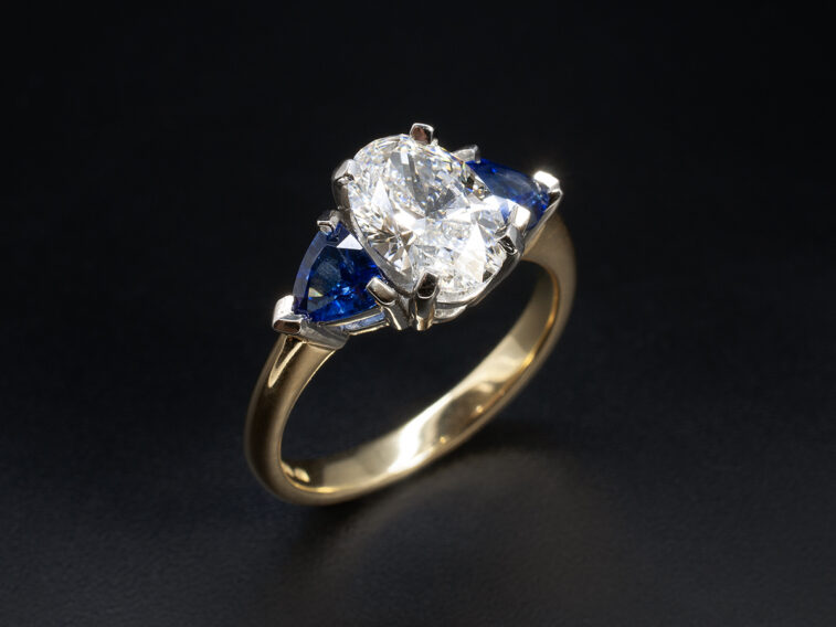 Ladies Diamond and Sapphire Trilogy Engagement Ring, 18kt Yellow Gold and Platinum Design, Oval Cut Lab Grown Diamond 1.50ct, Trillion Cut Blue Sapphires 0.85ct Total (2)