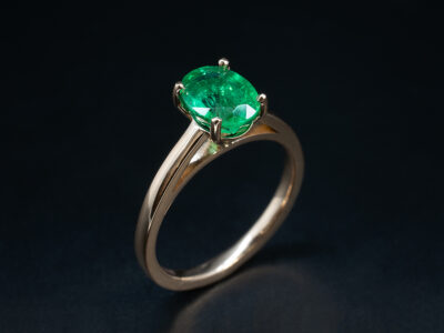 Ladies Solitaire Emerald Engagement Ring, 18kt Rose Gold Tapering 4 Claw Set Wed-fit Design, Oval Cut Emerald 1.29ct