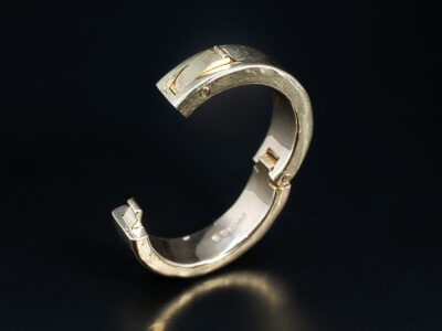 Gents Hinged Wedding Ring, 14kt Yellow Gold Flat Shaped Design, Rough Unfinished Texture, 7mm Width (open hinge view)