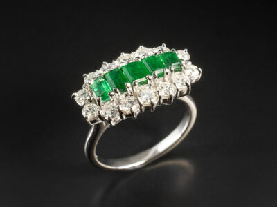 Ladies Diamond and Emerald Dress Ring, Platinum Claw Set Multi Stone Design, Emerald Cut Emeralds 1.00ct Total (5), Round Brilliant Cut Diamonds 1.22ct Total (14)