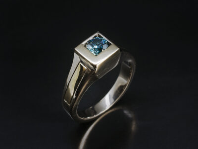 Ladies Blue Diamond Solitaire Dress Ring, 18kt Yellow and White Gold Rub over Set Design, Round 5.1mm Blue Diamond offset in 'L'-Shape Head