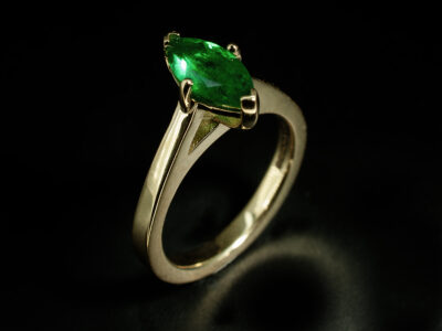 Ladies Emerald Solitaire Dress Ring, 18kt Yellow Gold Claw Set Design, Marquise Cut Emerald 0.67ct