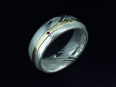Gents Bespoke Damascus Steel Wedding Ring, 18kt Yellow Gold Inlay Detail, Secret Set Diamond, Green Diamond and Ruby, Damascus Dense Twist Pattern