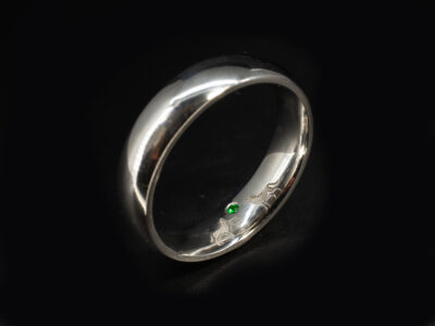Gents Emerald Celtic Wedding Ring, Platinum Court Shaped Secret Set Design, Round Brilliant Cut Emerald 0.01ct, Engraved Inner Band with Celtic Love Knot and Wolf Silhouette 2