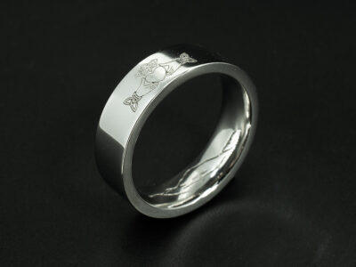 Gents Scottish Inspired Wedding Ring, Platinum Flat Court Shape Design, Laser Engraved Errigal Mountain Range on Inner Band, Claddagh Symbol Detail on Outer Band