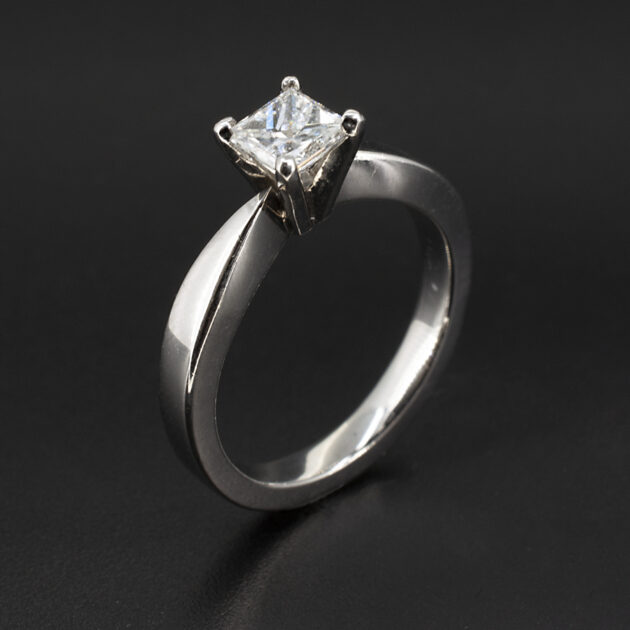 Platinum Claw Set Princess Cut Diamond Solitaire Engagement Ring 0.60ct on black