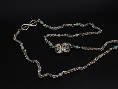9kt White Gold Longline Necklace, Thalia and Melpomene (comedy and tragedy) Drama Design with Sailors Knot Detail and Larimar Bead Detailing 