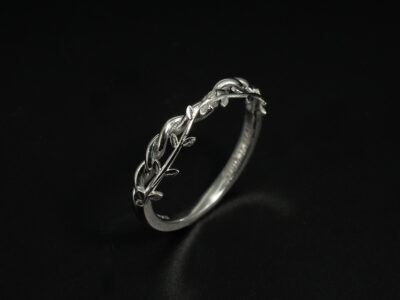 Ladies Contemporary Wedding Band, Platinum Court Shape Design with Leaf and Vine Leaf Twist Detail, Wishbone Shape