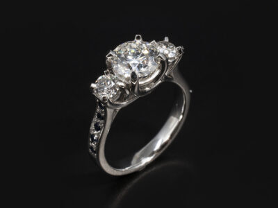 Ladies Diamond and Sapphire Engagement Ring, Platinum 4 Claw and Pavé Set Design, Round Brilliant Cut Diamond 1.52ct, Blue Sapphires 0.30ct (14) Set in Shoulders