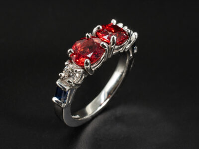 Ladies Diamond and Sapphire Half Eternity Ring, Platinum Claw and Half Rub over Set Design, Round Brilliant Cut Diamonds 0.36ct Total (2), Orange Sapphires 2.57ct Total (2), Blue Sapphires 0.39ct Total (2) 
