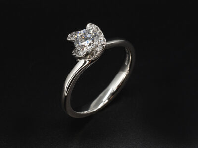 Ladies Multi Lab Grown Diamond Engagement Ring, Platinum Twist Claw and Pavé Set Design, Round Brilliant Cut Lab Grown Diamonds 0.61ct (1), 0.09ct Total (16)