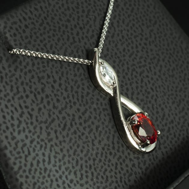 Bespoke Diamond and Blood Orange Sapphire Infinity Design Pendant in 18kt White Gold