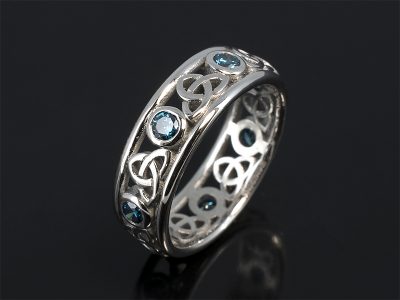 Ladies Celtic Wedding Ring with Blue Diamonds, 18kt White Gold Rub over Set Design, Round Brilliant Cut Blue Treated Diamonds 0.42ct (7), Celtic Knotwork Detailing