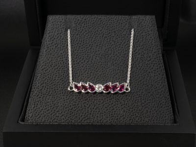 9kt White Gold Diamond and Ruby Bracelet, Pear Cut Rubies 1.34ct Total (3), Round Brilliant Cut Lab Grown Diamond 0.10ct 
