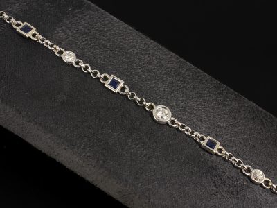 9kt White Gold Diamond and Sapphire Belcher Bracelet, Square Cut Blue Sapphires 0.37ct Total (3), Round Brilliant Cut Diamonds 0.49ct Total (8)
