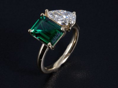 Ladies Diamond and Emerald Toi Et Moi Engagement Ring, 9kt Yellow Gold Claw Set Design, Pear Cut Lab Grown Diamond 1.13ct, Hydro Synthetic Octagon Cut Green Emerald 2.62ct