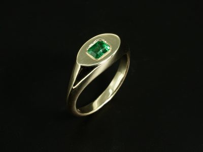 Ladies Emerald Solitaire Dress Ring, 9kt Yellow Gold Secret Set Pinkie Signet Ring Design, Emerald Cut Emerald 0.21ct