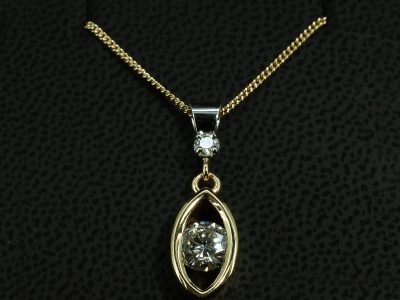Platinum and 18kt Yellow Gold Diamond Drop Pendant, Round Brilliant Cut Diamond Set Bale, Round Brilliant Cut Tension Set Diamond Drop