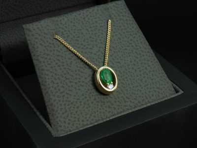 9kt Yellow Gold Emerald and Diamond Pendant, Rub over Set Design, Oval Cut Green Emerald approx 0.21ct, Lab Grown Round Brilliant Cut Diamond 0.08ct 