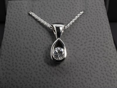 9kt White Gold Diamond Solitaire Pendant, Part Rub over Set Design, Round Brilliant Cut Diamond 0.42ct