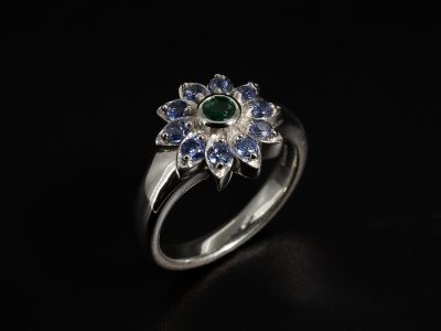 Ladies Coloured Stone Floral Design Engagement Ring, 9kt White Gold Rub over Set Design, Round Cut Green Emerald 0.11ct, Round Cut Purple Tanzanite 0.42ct Total (10)