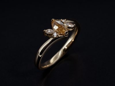 Ladies Champagne Diamond Engagement Ring, 18kt Yellow Gold Claw Set Twist Design, Marquise Cut Champagne Diamond 0.54ct, Round Brilliant Cut and Marquise Cut Diamond Side Stones 1.5mm x3, 1.5mm x1