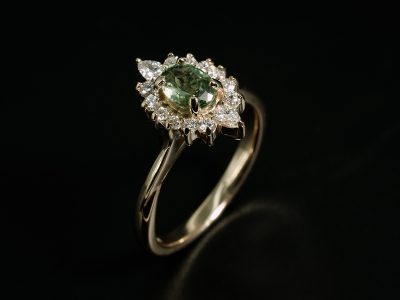 Ladies Sapphire and Diamond Engagement Ring, 18kt Yellow Gold Claw Set Halo Design, Oval Cut Green Sapphire 0.72ct, Pear Cut Lab Grown Diamonds 0.11ct (2), Round Brilliant Cut Lab Grown Diamonds 0.20ct (12) 