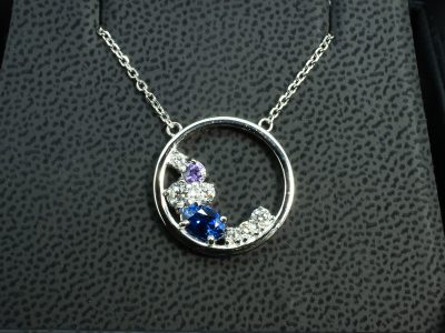 Ladies Platinum Diamond and Coloured Stone Pendant, Claw Set Diamond, Round Brilliant Cut Diamonds, Oval Cut Blue Sapphire and Round Purple Sapphire