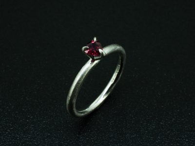 Ladies Solitaire Ruby Engagement Ring, Platinum Claw Set Design, Triangle Cut Ruby 0.52ct, Flail Finish Band