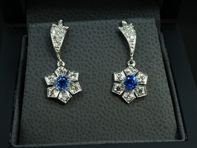 Platinum Diamond and Sapphire Earrings, Claw Set Round Brilliant Cut Diamonds 0.59ct Total (27), Round Cut Sapphires 0.50ct Total (2)