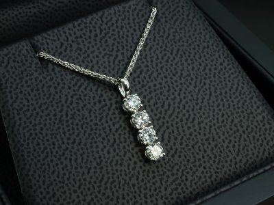 Platinum Diamond Drop Pendant, Claw Set Design on Platinum Spiga Chain, Round Brilliant Cut Diamonds set in a Vertical Column